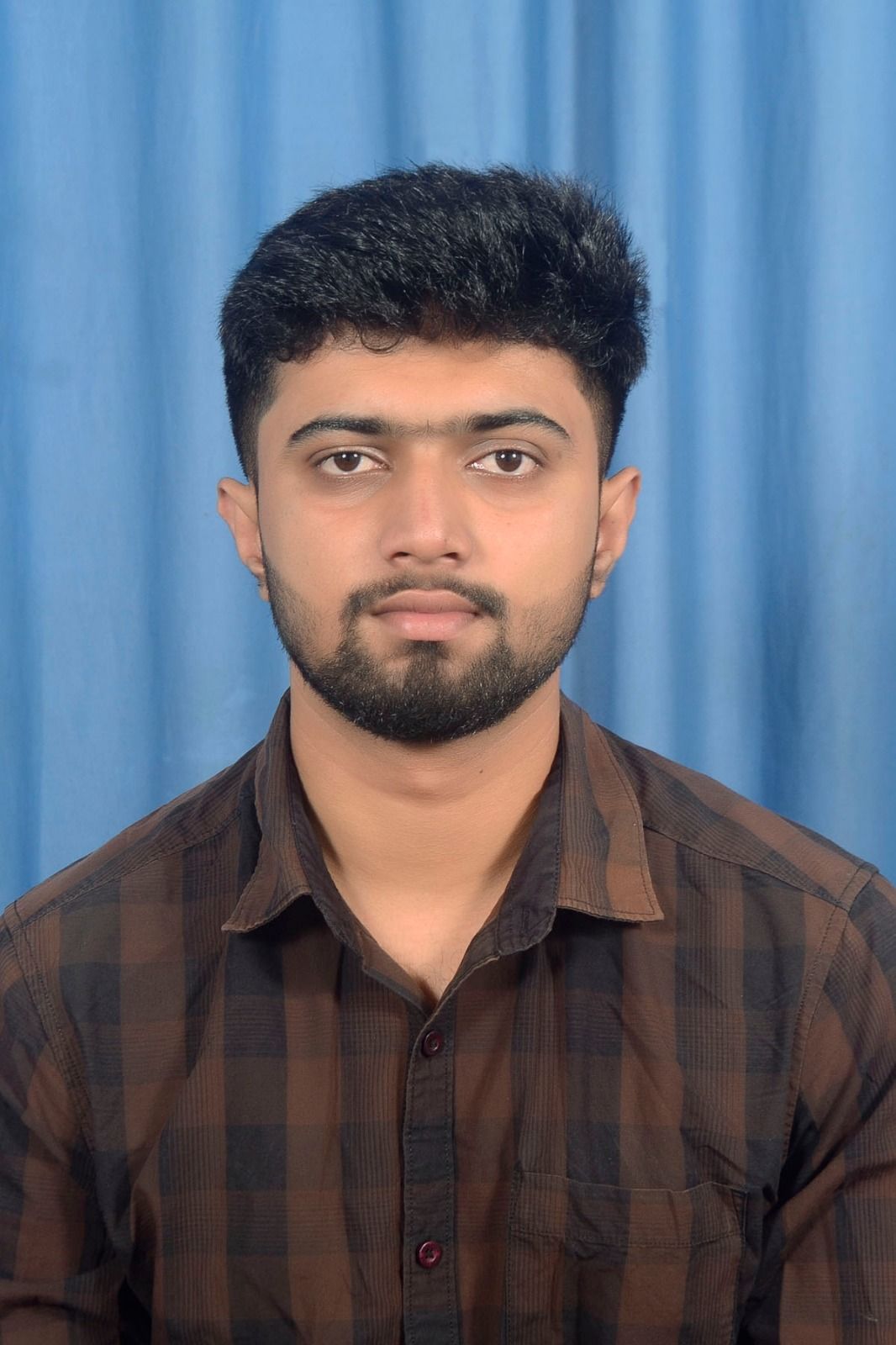 DIWAKAR PRALHAD NADAGER
